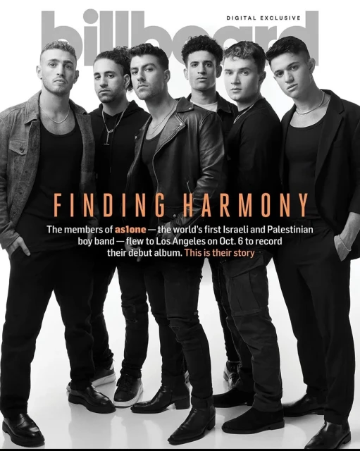 Group of six young adult men pose on the cover of Billboard magazine; they wear black clothing; the setting is a photo studio.
