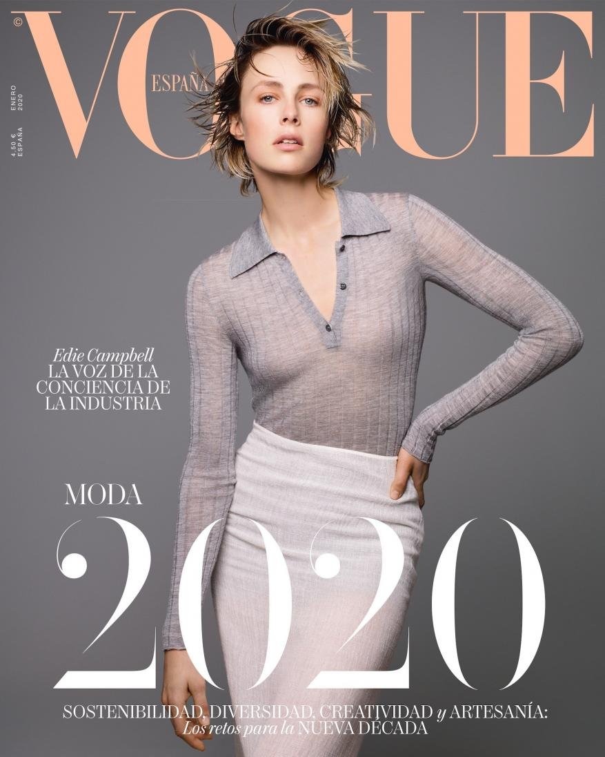 Vogue España magazine cover featuring Edie Campbell in a grey top and white skirt, promoting sustainability and diversity in 2020.
