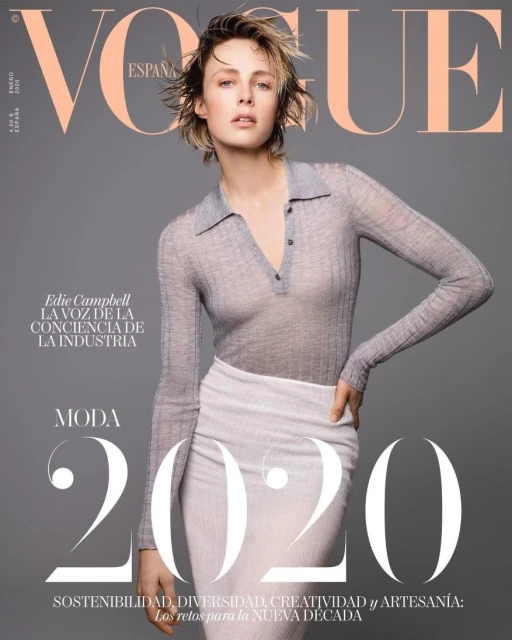 Vogue España magazine cover featuring Edie Campbell in a grey top and white skirt, promoting sustainability and diversity in 2020.