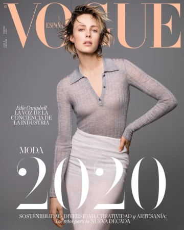 Vogue España magazine cover featuring Edie Campbell in a grey top and white skirt, promoting sustainability and diversity in 2020.