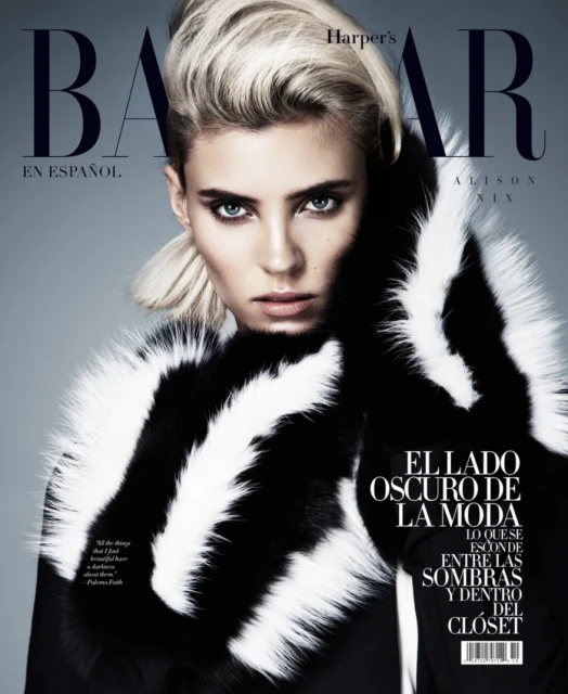 Magazine cover featuring a blonde woman with a fur collar, promoting dark fashion. Harper's Bazaar logo is visible on the top.