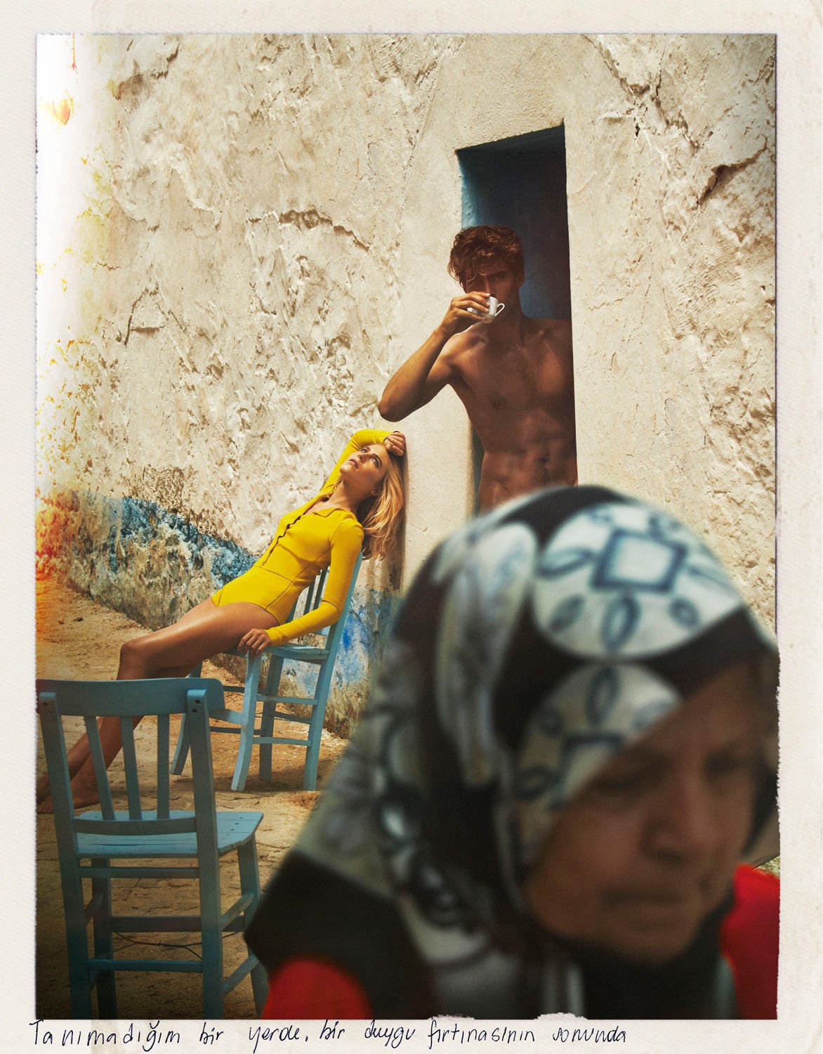 Fashion editorial shot of a female model reclining, a man drinking, and a veiled woman foregrounded against a textured wall.