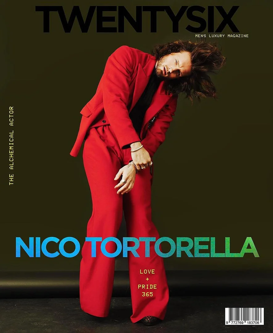 Magazine cover featuring Nico Tortorella in a red suit, the title 'TwentySix Men's Luxury Magazine', with a green and blue gradient title.
