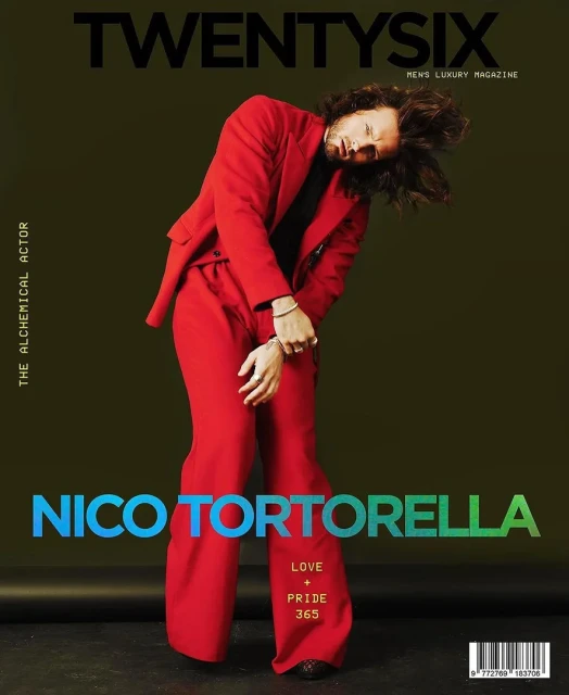 Magazine cover featuring Nico Tortorella in a red suit, the title 'TwentySix Men's Luxury Magazine', with a green and blue gradient title.