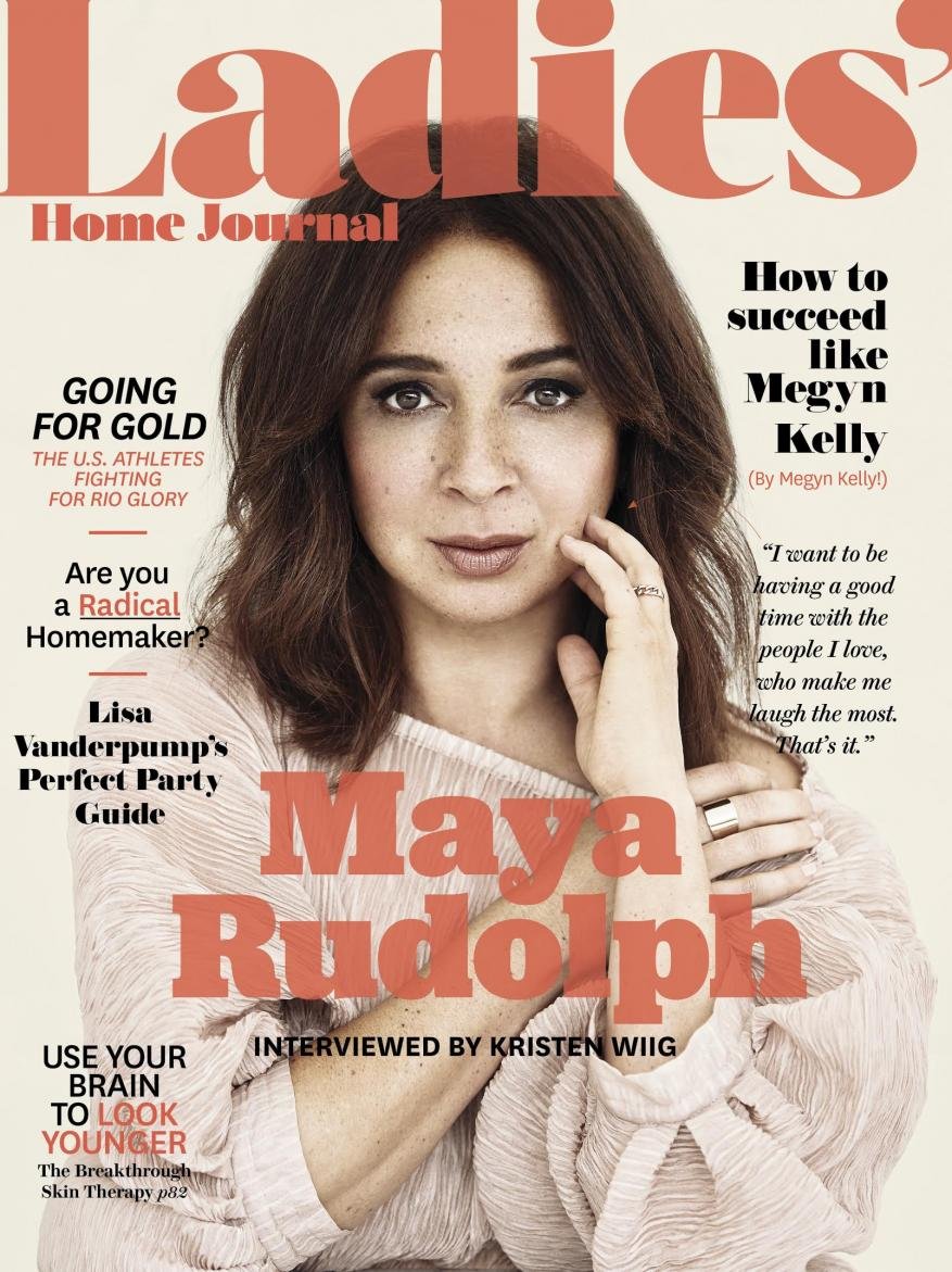 Close-up of Maya Rudolph on a magazine cover, featuring a coral-colored title, along with additional text detailing the magazine's content.