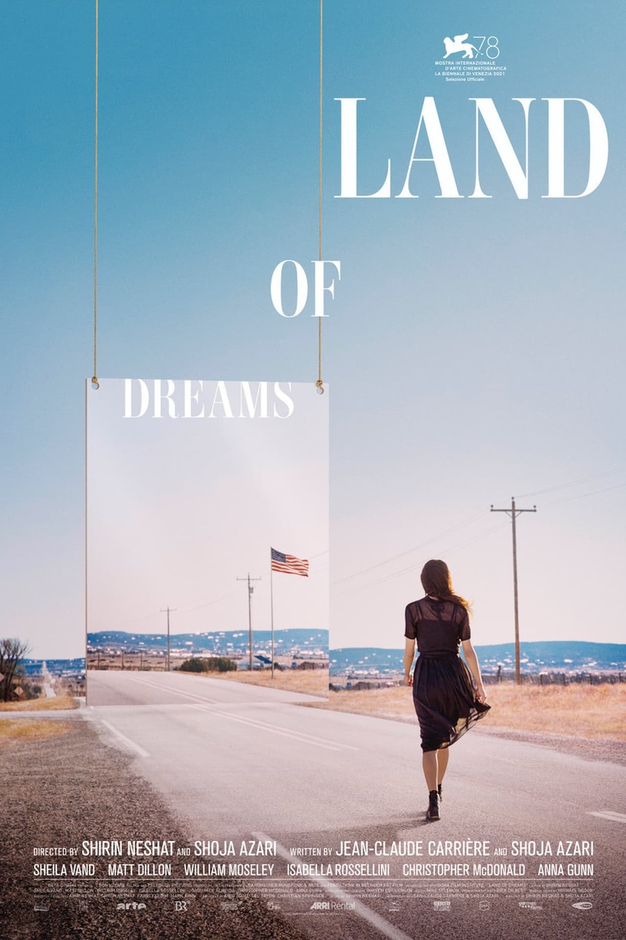 Movie poster featuring a woman walking on a road toward a mirror reflecting a landscape with an American flag under a blue sky.