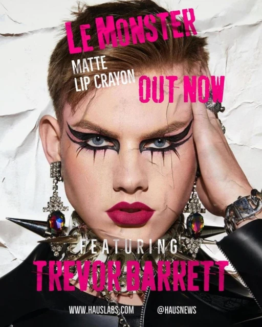 Beauty advertisement featuring a person with dramatic makeup, dark lipstick, striking winged eyeliner, and statement jewelry, with text overlays.
