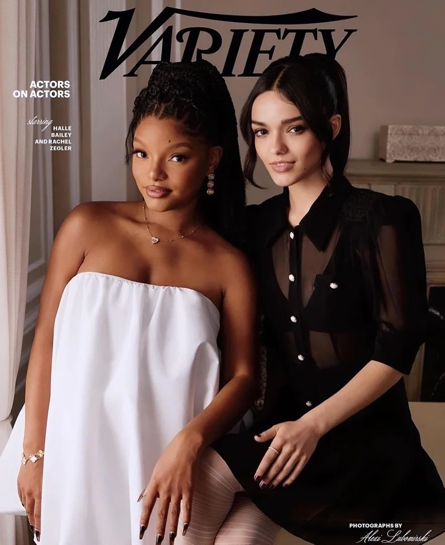 Variety magazine cover featuring actresses Halle Bailey and Rachel Zegler, indoor shot with soft lighting and muted colors, portrait.
