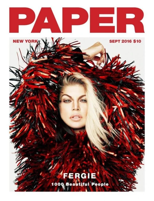 Magazine cover featuring Fergie in a tinsel-like garment with red and black, posing against a white background with 'PAPER' at the top.