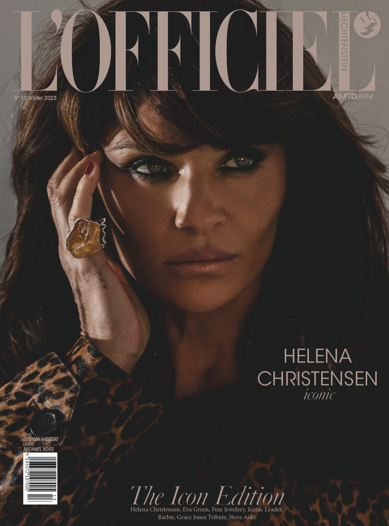 Helena Christensen stars on a magazine cover. The portrait features Christensen in a leopard print jacket and a large gemstone ring.