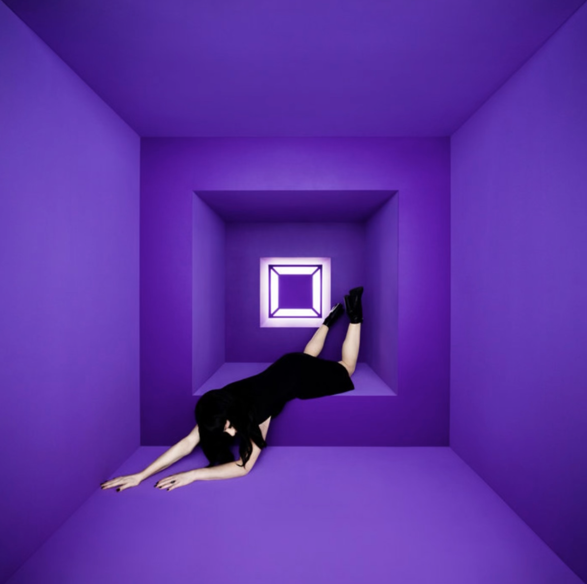 Woman in a black dress strikes a pose in a purple room, with a bright square light in the background, creating a surreal and modern scene.