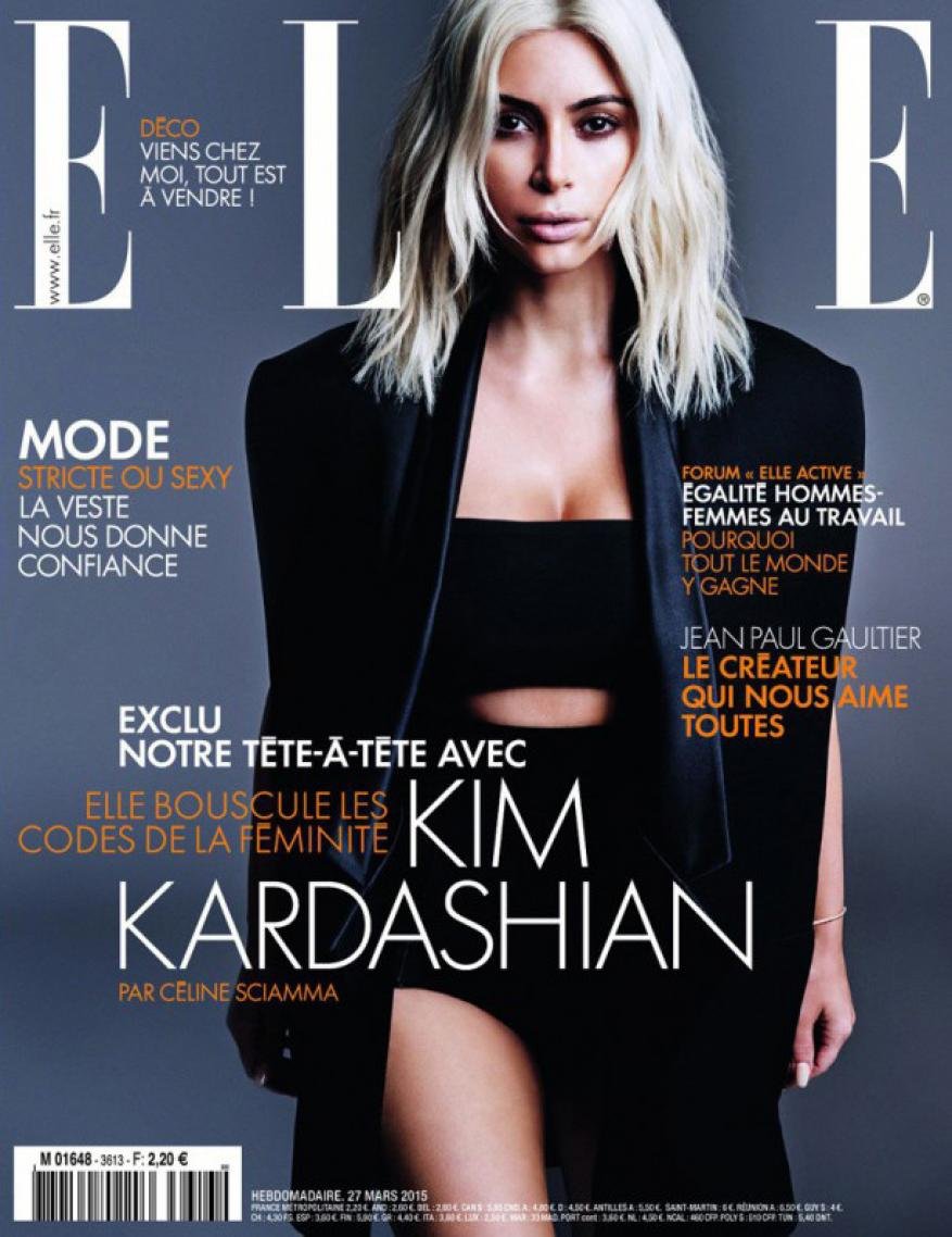 Magazine cover featuring Kim Kardashian in a black jacket with blonde hair against a grey background. The 'ELLE' logo is visible at the top.