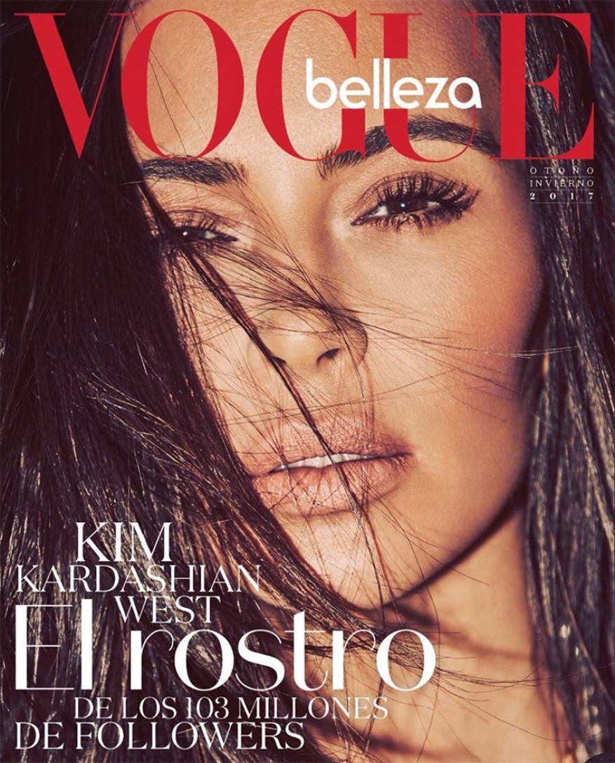 Vogue Belleza cover featuring a close-up portrait of Kim Kardashian West with light skin, brown hair, and striking eye makeup.