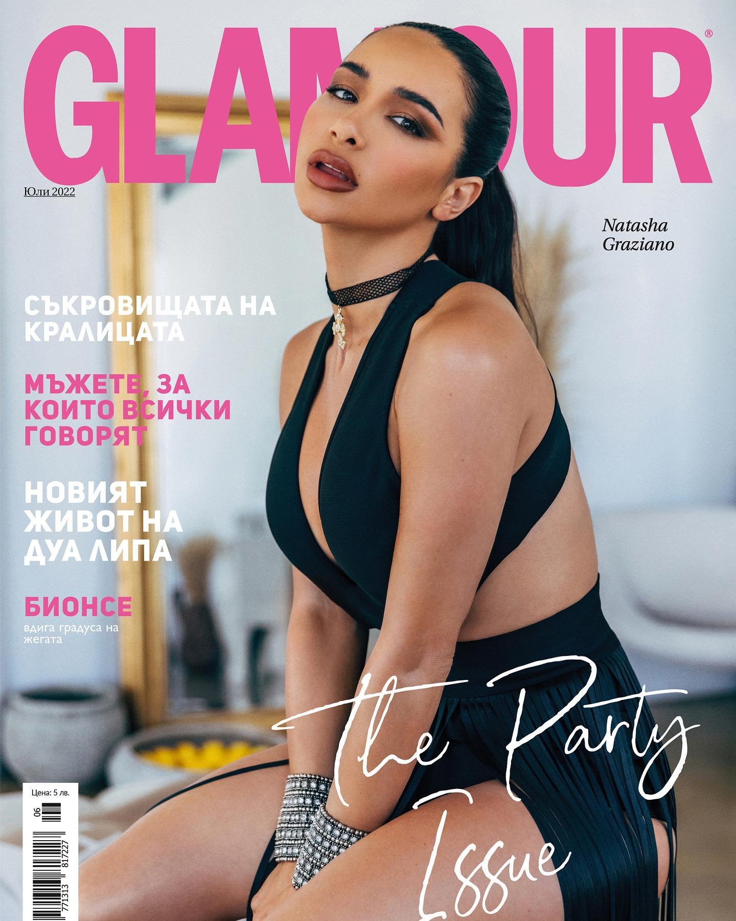 Glamour magazine cover featuring Natasha Graziano in a black outfit, seated pose, wearing jewelry, with pink Glamour logo and text.