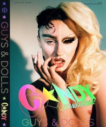 Portrait of a person with split-dyed black and blonde hair and dramatic makeup holding a lit cigarette