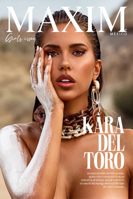 Maxim magazine cover featuring a young woman with face paint, wearing a chunky necklace, and posing against an out-of-focus background.