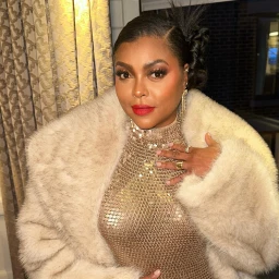 Portrait of Taraji P. Henson wearing a metallic sequined dress and a fluffy cream faux fur coat with makeup by Saisha Beecham.
