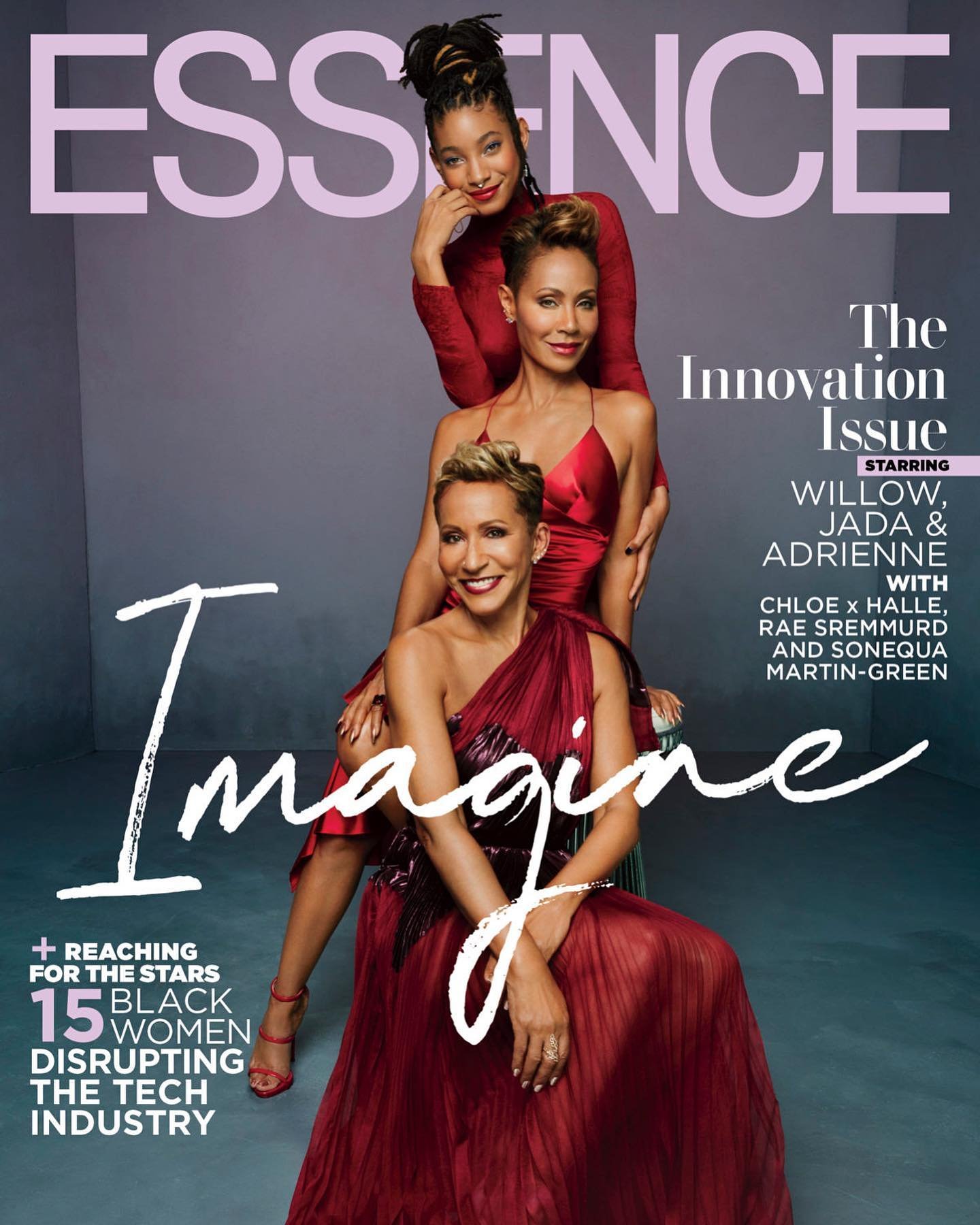 Essence magazine cover featuring three women in red gowns, photographed in a studio setting with a soft grey background and bright lighting.