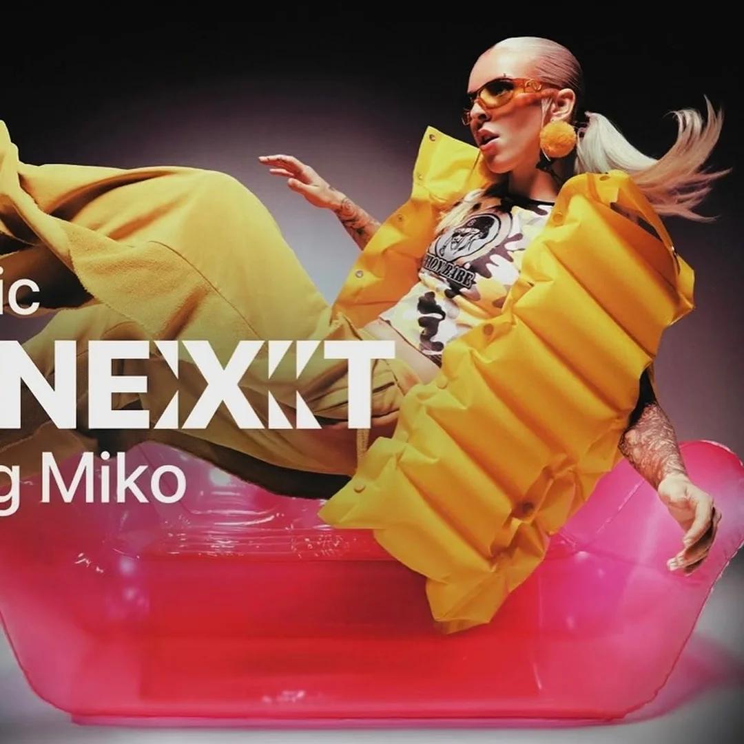 Woman with platinum-blonde hair in yellow clothing sitting in a translucent pink tub with text overlay and a grey gradient background.