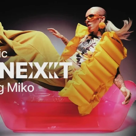Woman with platinum-blonde hair in yellow clothing sitting in a translucent pink tub with text overlay and a grey gradient background.