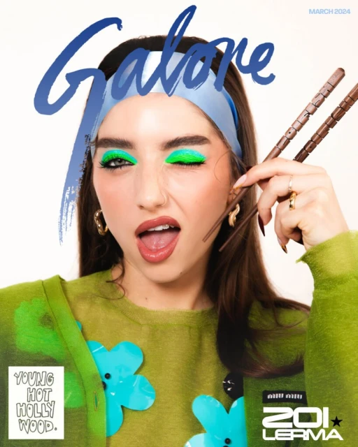 Magazine cover featuring a young woman with bright green eyeshadow and a headband, holding chopsticks with a playful expression.