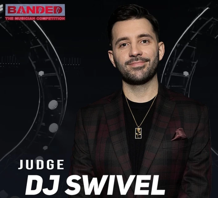 Headshot of DJ Swivel, a musician competition judge, wearing a black shirt, gold necklace, and plaid jacket against a dark backdrop.