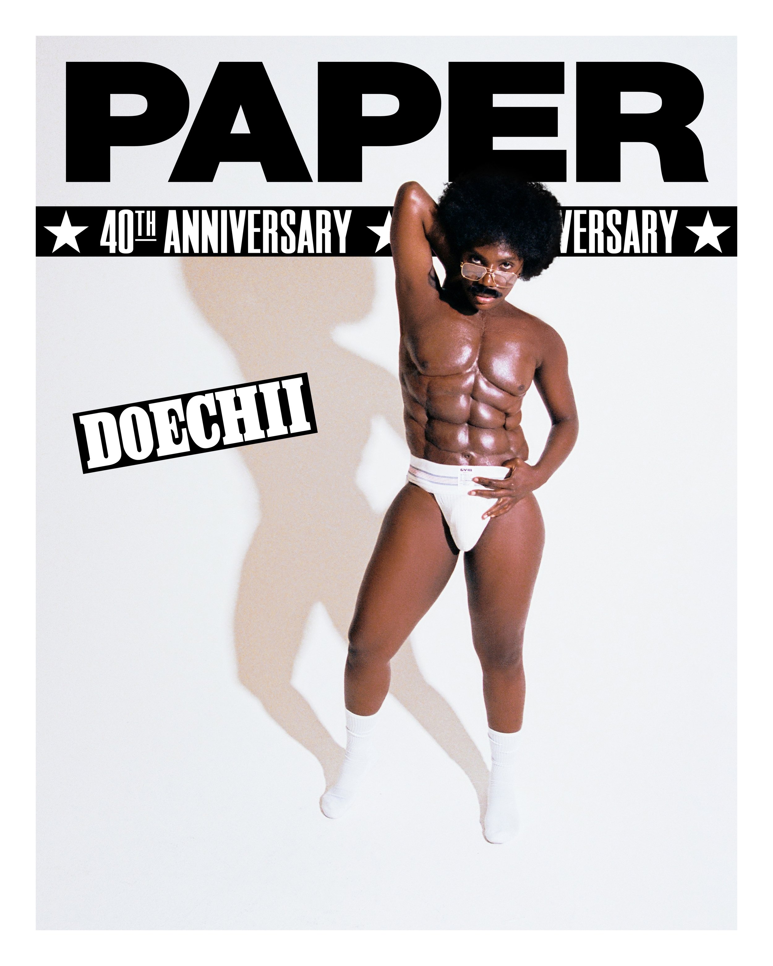 Doetchii on Paper magazine cover styling by Tyler Minor, wearing white briefs and glasses against a white background