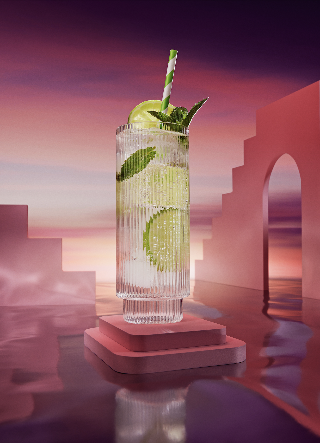 Refreshing beverage with lime, ice, and a striped straw, presented on a pink platform against a surreal sunset background.