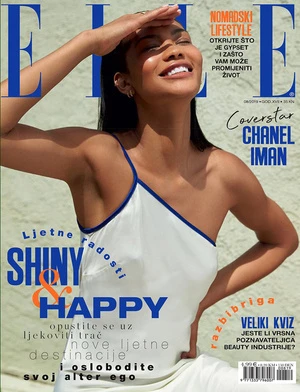 Chanel Iman on the cover of Elle magazine, posing in a bright studio environment with neutral colors and diffused lighting.