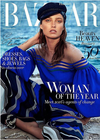 Bazaar Australia December 2016 cover featuring a woman in blue outfit, blue hat with ocean backdrop, promoting fashion, beauty, and agents of change.