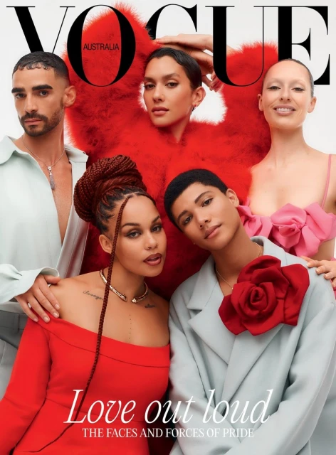 Vogue Australia cover featuring five models in red and pastel outfits. The models are posing in front of a white background with a bold Vogue logo.