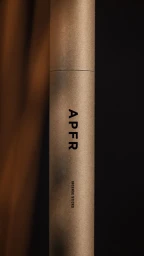 Vertical close up of a brown cardboard tube packaging with APFR INCENSE STICKS printed vertically against dark background.