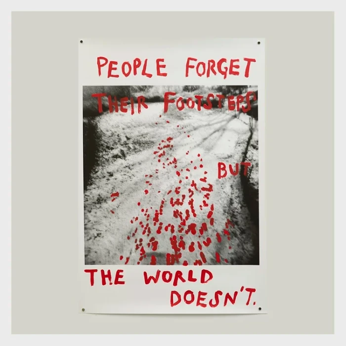 Mixed media artwork by Catherine Black featuring a black and white landscape photo with bold red handwritten text layered over top.