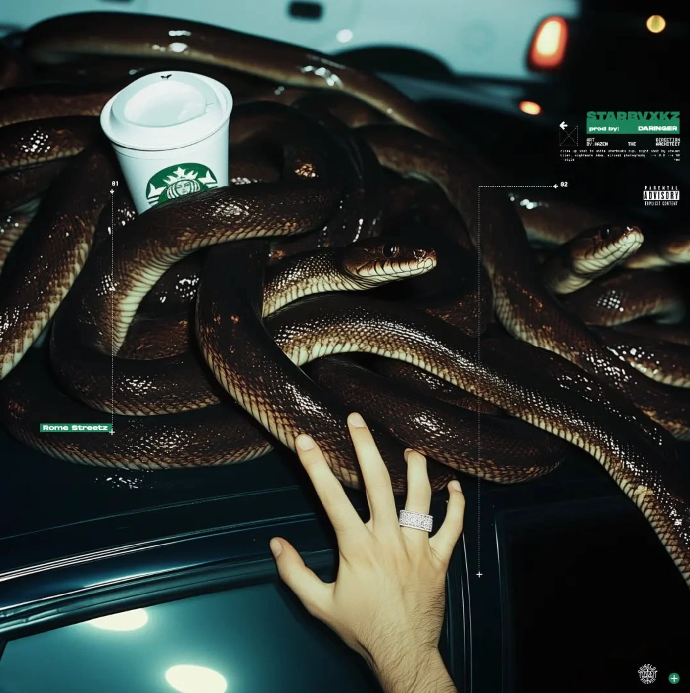 Hand with diamond ring touching snakes on car roof next to a Starbucks cup