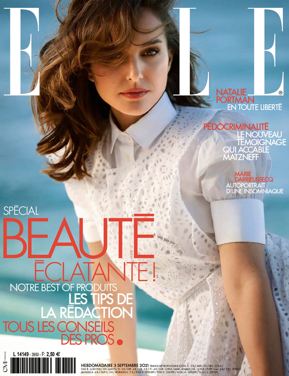 Elle magazine cover featuring Natalie Portman wearing a white dress, with the magazine's text and logo visible against a blurred background.