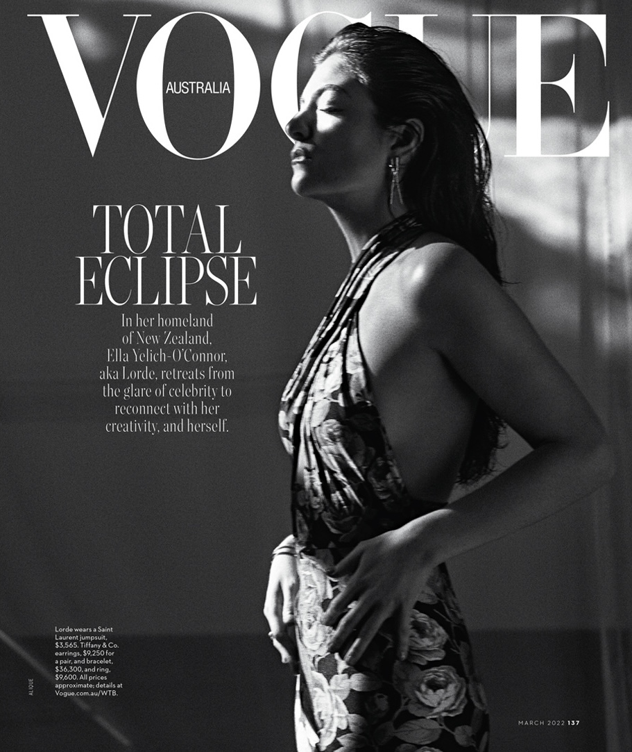 Vogue Australia cover featuring Ella Yelich-O'Connor (aka Lorde) in a floral dress, with eyes closed and face tilted towards the light.