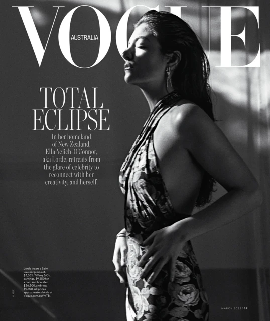 Vogue Australia cover featuring Ella Yelich-O'Connor (aka Lorde) in a floral dress, with eyes closed and face tilted towards the light.