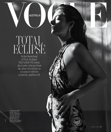 Vogue Australia cover featuring Ella Yelich-O'Connor (aka Lorde) in a floral dress, with eyes closed and face tilted towards the light.