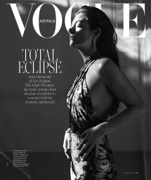 Monochrome magazine cover portrait of singer Lorde in profile wearing a floral patterned halter dress