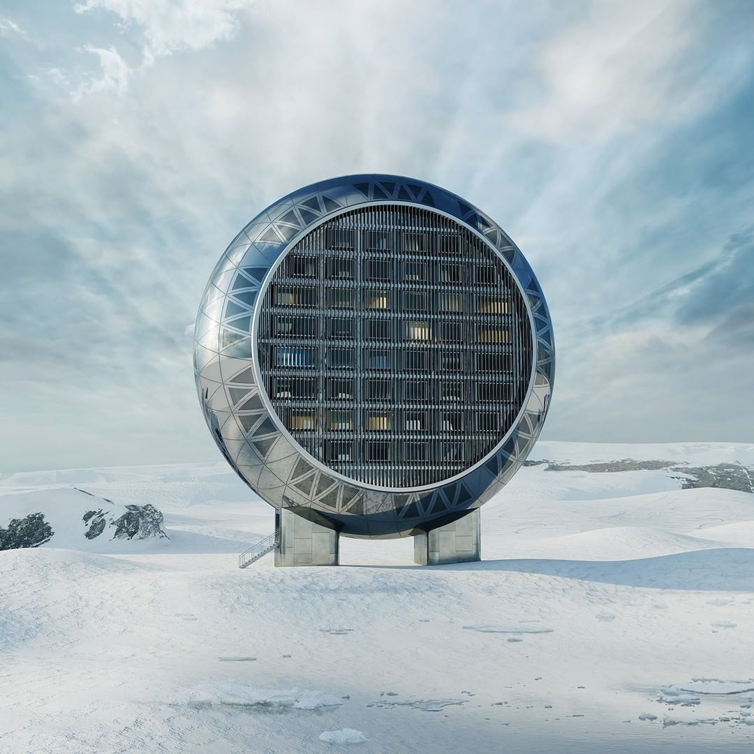 Futuristic round building on concrete pillars, set in a snow-covered landscape with a cloudy sky, evoking a sense of innovation and isolation.