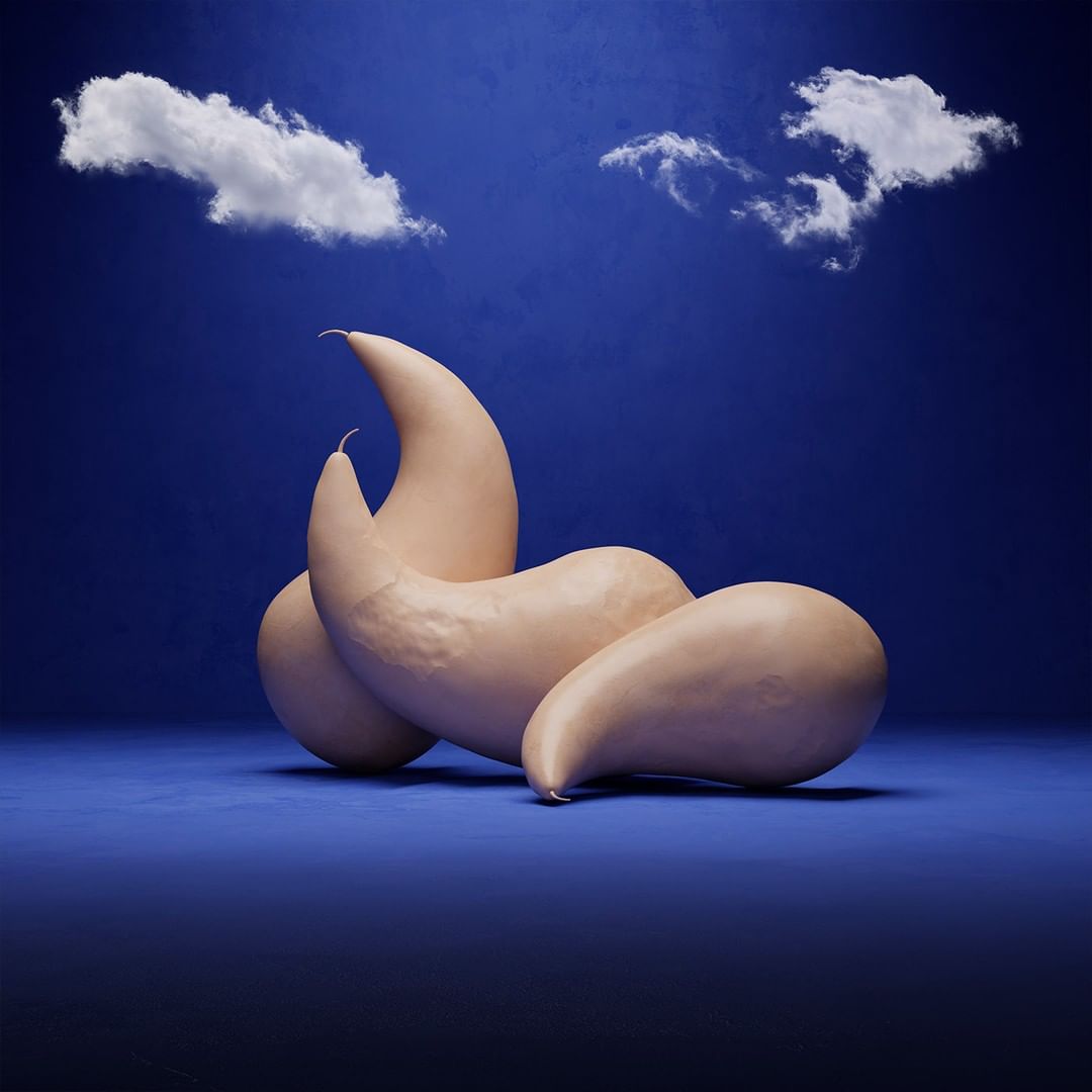Abstract sculpture of elongated gourd-like forms against a gradated blue backdrop with soft clouds, creating a surreal and dreamy visual.