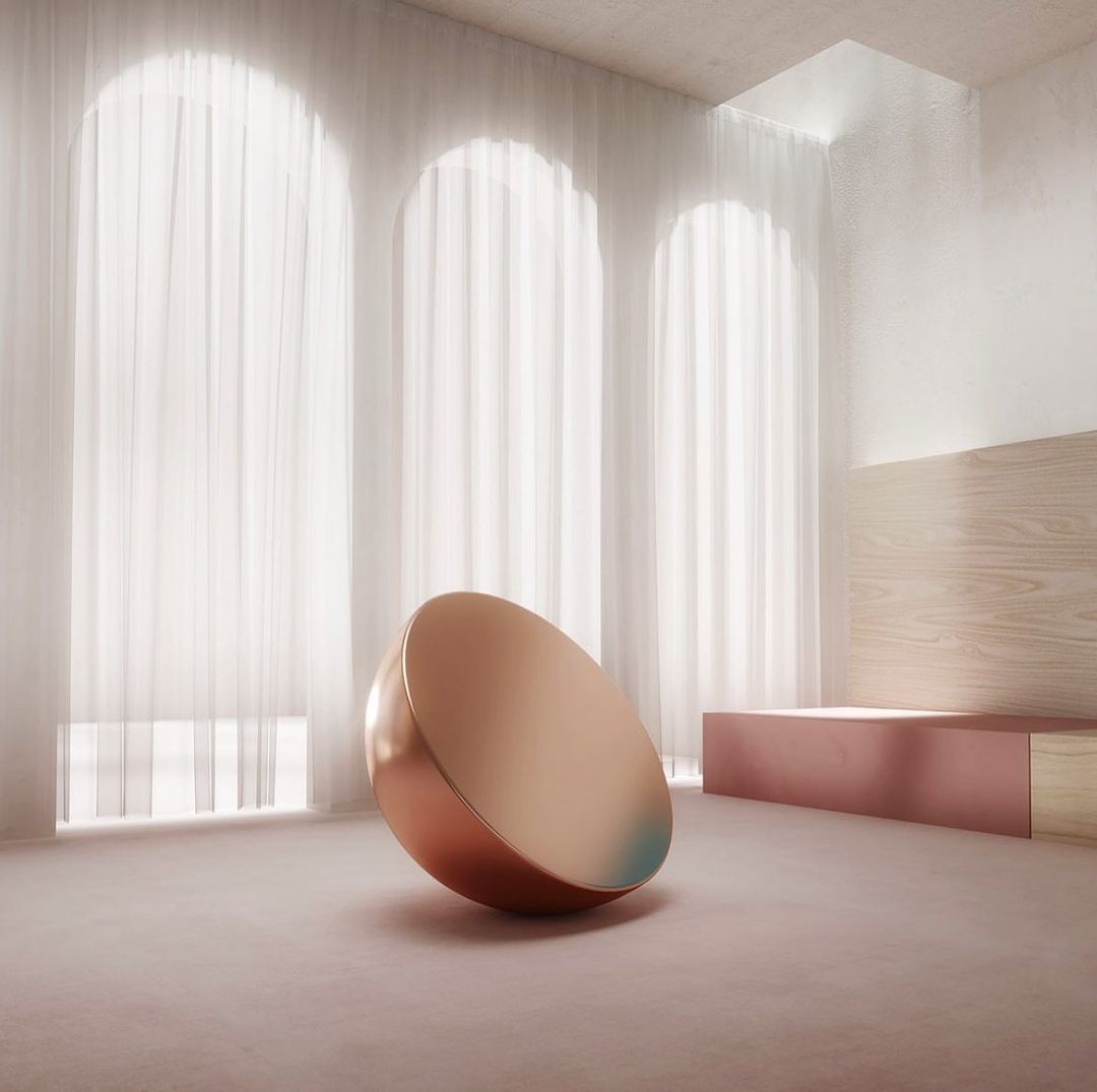 Indoor space featuring a copper-colored semi-sphere sculpture against a backdrop of sheer curtains and minimalist architectural details.