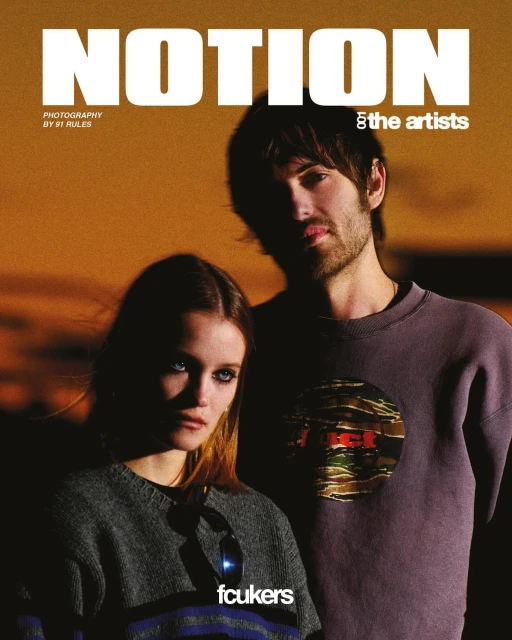Magazine cover featuring a young adult male and female looking at the camera with a golden sunset-like background with 'NOTION' in text.