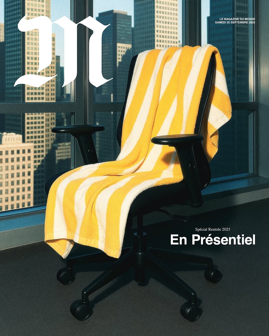 Magazine cover featuring an office chair draped with a yellow and white striped towel against a high-rise cityscape backdrop.