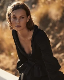Portrait of a woman wearing a black blouse outdoors in Los Angeles, captured by photographer Adam Franzino.