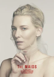 Portrait of Cate Blanchett draped in a sheer white veil against a pale background with red text overlay