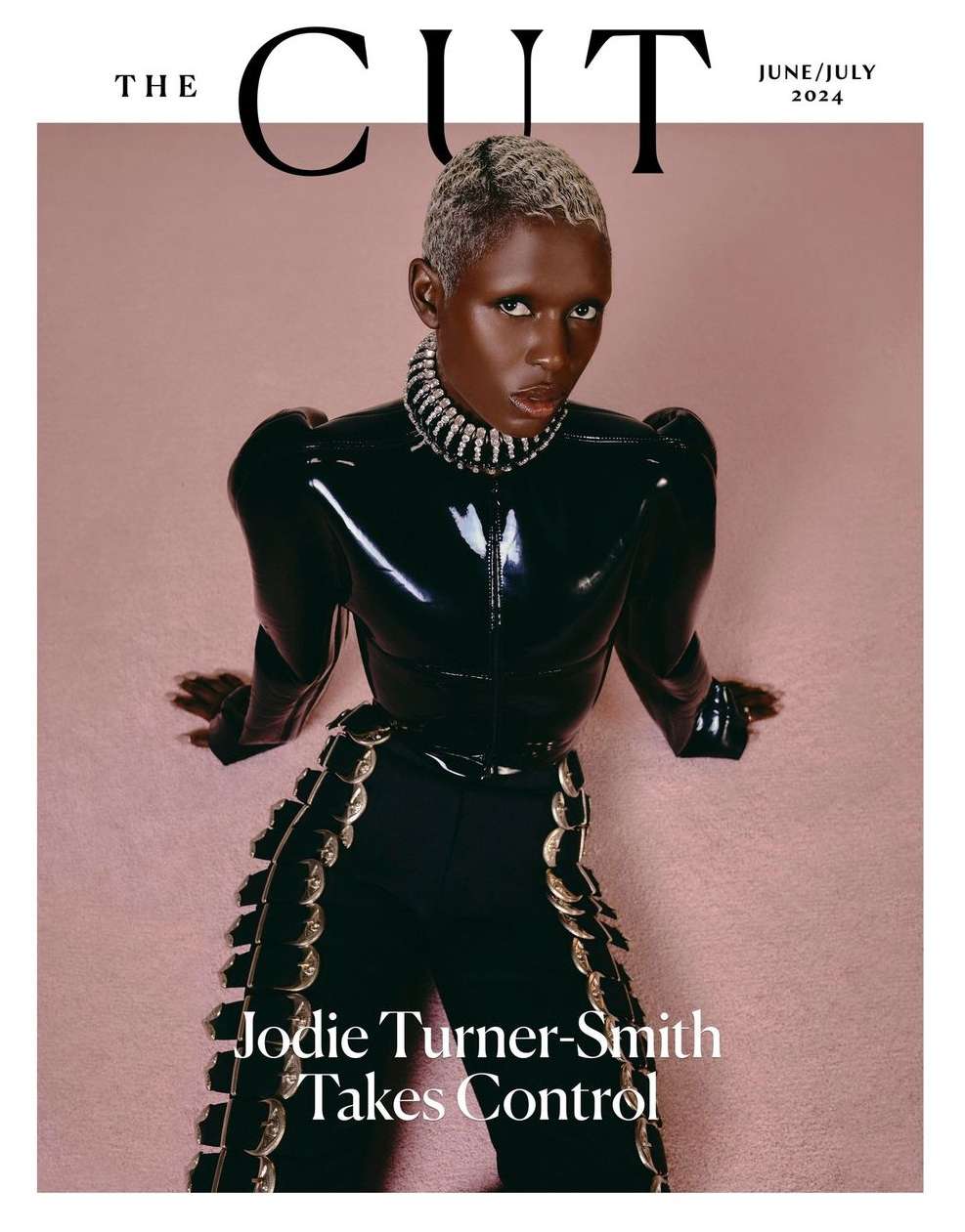 Fashion magazine cover featuring Jodie Turner-Smith wearing a glossy black outfit with a jeweled collar and ornate black pants.