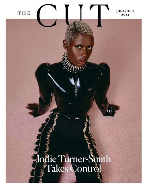Fashion magazine cover featuring Jodie Turner-Smith wearing a glossy black outfit with a jeweled collar and ornate black pants.