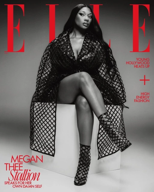 Magazine cover featuring Megan Thee Stallion in a black dress and strappy heels, seated against a grey background with red text.