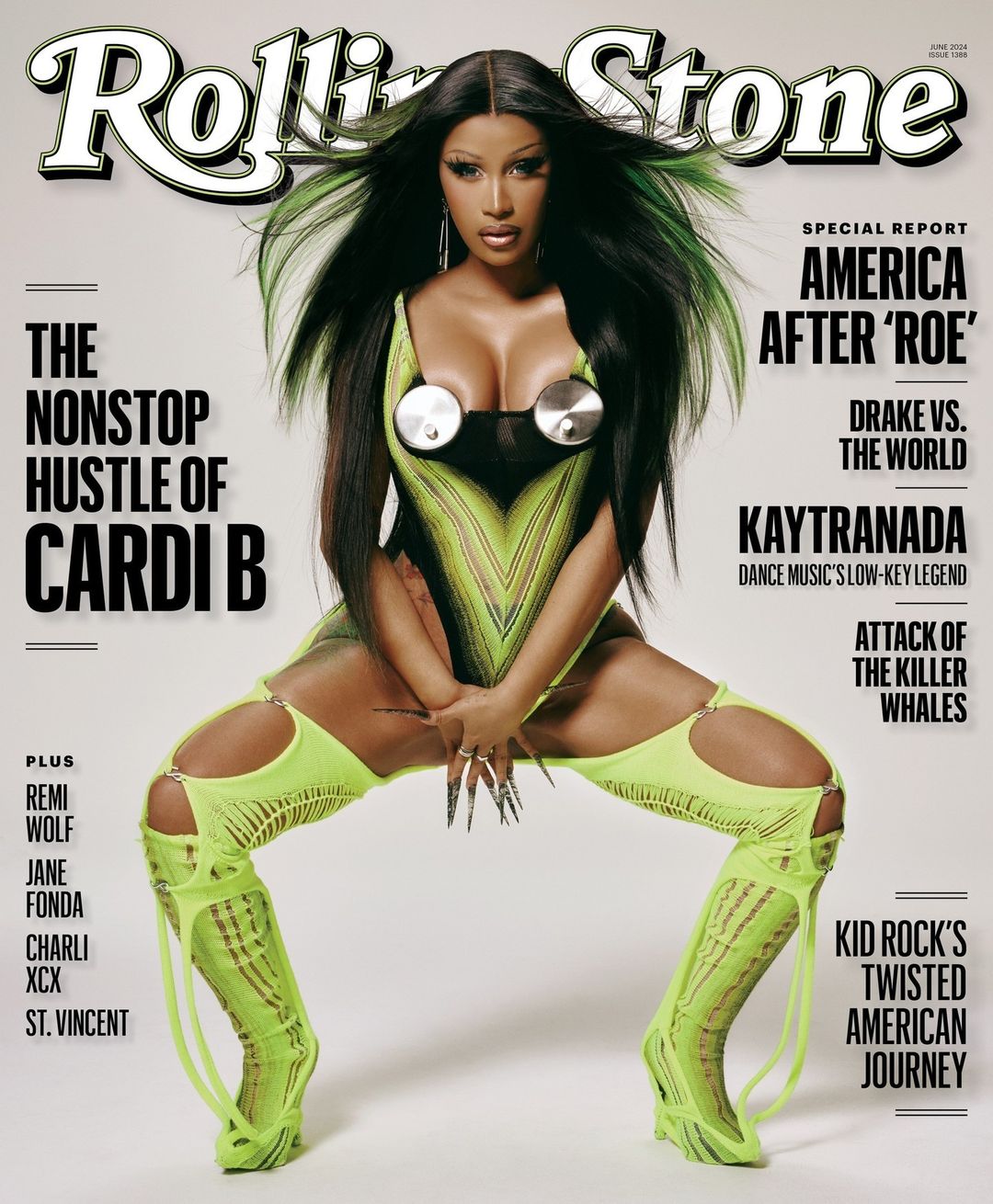 Magazine cover featuring Cardi B in a futuristic, neon-green outfit, posing with spread legs and long nails. The Rolling Stone logo is visible.